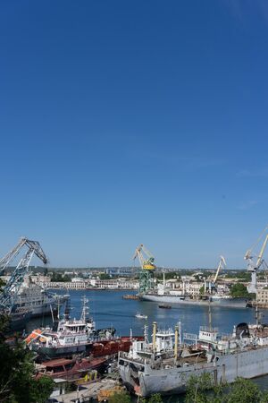 Sevastopol, Crimea-may 31, 2018: Urban landscape with views of ships and buildings in the open air.のeditorial素材