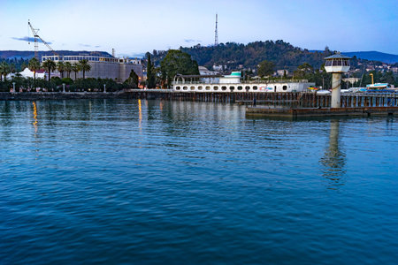 Sukhumi, Abkhazia-March 7, 2016: Seascape with the sights of the city at sunset.