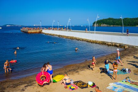 Vladivostok, Russia-August 19, 2018: Seascape with the coastline of the beach in the campus on the island of Russian.のeditorial素材
