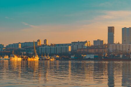 Vladivostok, Russia-January 29, 2019: Urban landscape overlooking the sea coastline with buildings and ships.のeditorial素材