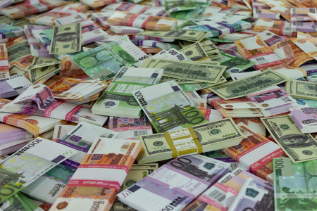 Abstract background with fake banknotes of money from different countries.の写真素材