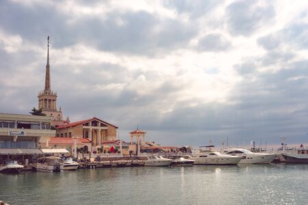 Sochi, Russia-October 6, 2016: Urban landscape with views of the seaport, buildings and water transport.のeditorial素材