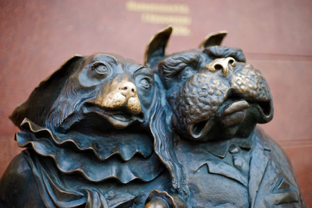 Krasnodar, Russia-may 30, 2014: the Famous sculpture of two dogs at the marble wall.