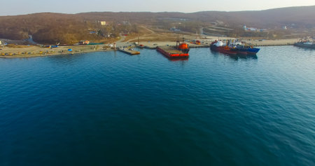 Vladivostok, Primorsky Krai - April 21, 2019: Air review of the coastline of the Russian island with...