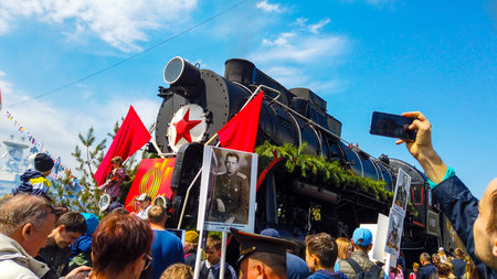 Vladivostok, Primorsky Krai - may 9, 2019: Ship quay, a lot of people celebrate the Victory Day.