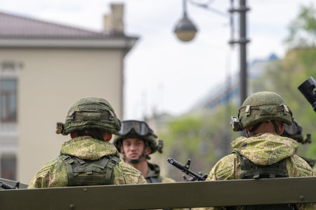 Vladivostok, Primorsky Krai - may 9, 2019: Military men in the back of the car on the background of...