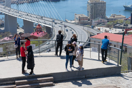 Vladivostok, Russia - may 3, 2019: Tourists on the observation platform of the city.