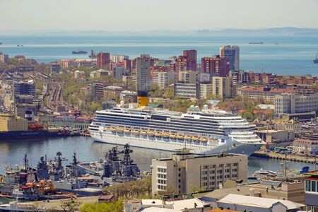 Vladivostok, Russia - may 3, 2019: Urban landscape from a height. View of the Bay and cruise ship.のeditorial素材