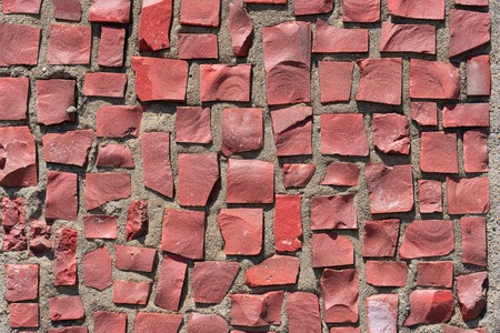 Background of solid pieces of mosaic on the wall.の写真素材