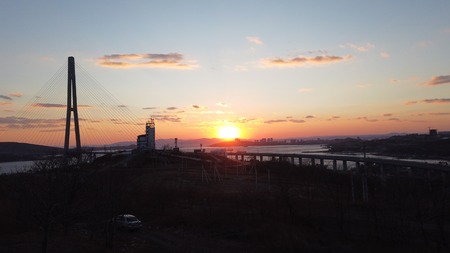 Landscape with views of the Russian bridge at sunset. Vladivostok, Primorsky Kraiの写真素材