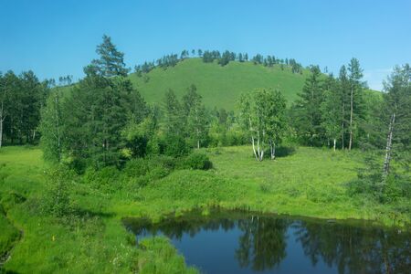 Natural landscape with green forests and rivers.の写真素材