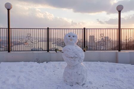 Bigfoot on the background of the urban landscape during sunset.の写真素材