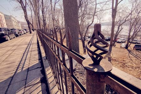 Vladivostok, Primorsky Krai - April 3, 2019: Urban landscape with a pedestrian sidewalk on the street Svetlanskaya.の写真素材