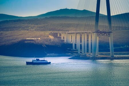 Air review of the Russian bridge on the background of the sea landscape.の写真素材