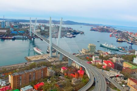 Aerial view of the panorama of Vladivostok overlooking the Golden bridge.の写真素材