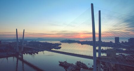 Aerial view of the panorama of Vladivostok overlooking the Golden bridge.の写真素材
