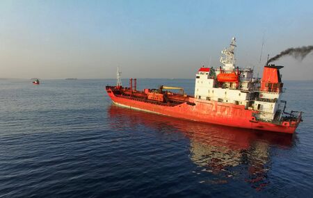 Red ship on the background of the seascape. Vladivostok, Russiaの写真素材