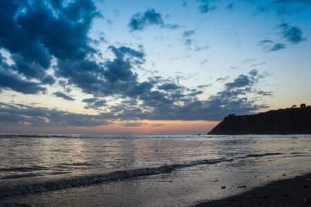 Seascape with a dramatic evening sky.の写真素材