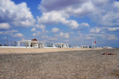 Evpatoria, Crimea. Beautiful Sunny beach with white gazebos.の写真素材