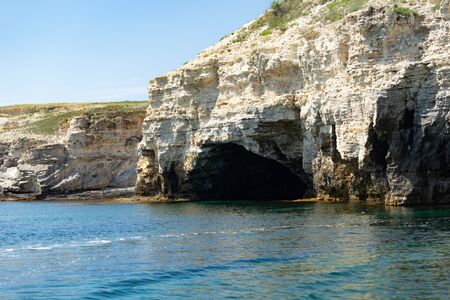 Beautiful view of us we are with the rocky shore of the black sea and the green-blue water on a Sunny summer cloudless day. Tarkhankut national reserve. Republic Of Crimeaの写真素材
