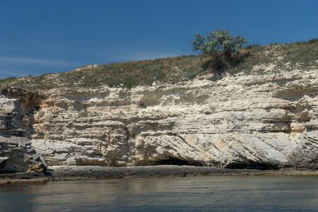 Beautiful view of us we are with the rocky shore of the black seaの写真素材