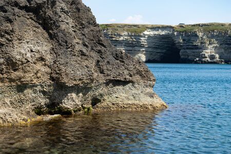 Beautiful view of us we are with the rocky shore of the black sea and the green-blue water on a Sunny summer cloudless day. Tarkhankut national reserve. Republic Of Crimeaの写真素材