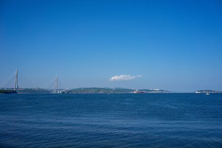 Vladivostok, Russia. Marine landscape with views of the Russian bridge on the horizon.の写真素材