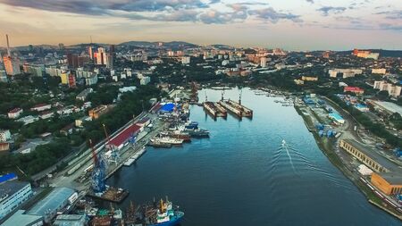 Vladivostok, Russia-August 31, 2019: Aerial view of the cityscape at sunset.のeditorial素材