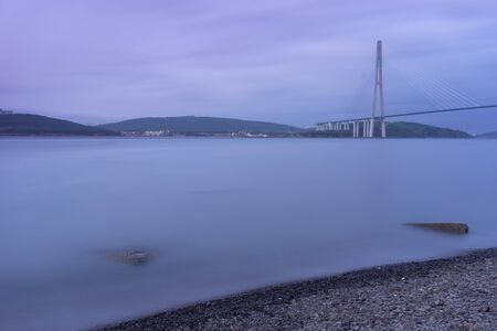 Seascape with coastline in blue hour. Vladivostok, Russiaの写真素材