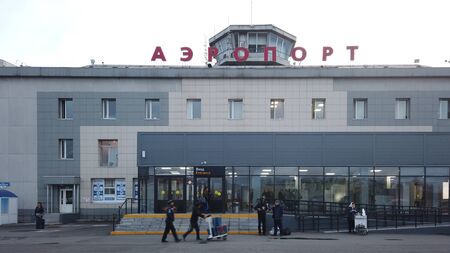 Petropavlovsk-Kamchatsky, Russia - October 4, 2019: the building of the airport Elizovo in the background of the morning sky.のeditorial素材