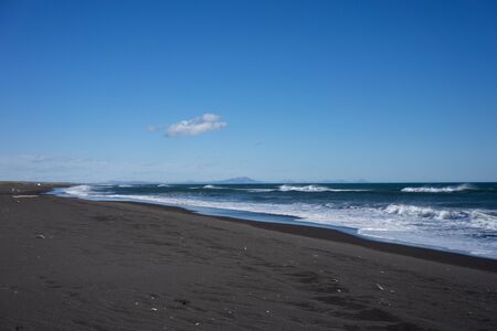 Seascape with Alatyrsky volcanic beach on the Kamchatka Peninsula.の写真素材