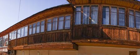 Gurzuf, Crimea - may 29, 2018: Panorama of the facade of a wooden building with Windows against the skyのeditorial素材