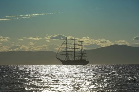 Vintage white sailboat on the background of the seascape. Vladivostok, Russiaの写真素材