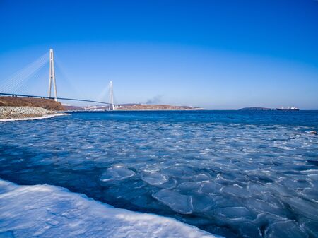 Vladivostok, Russia.Russian bridge against the blue sky.の写真素材