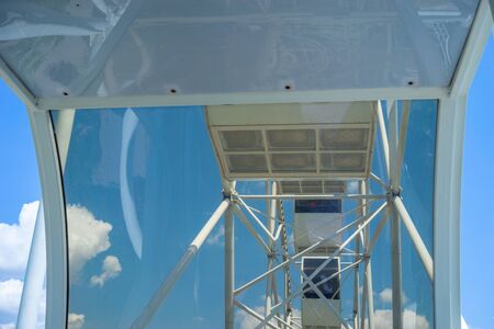 View from the cab of the Ferris wheel against the sky.の写真素材