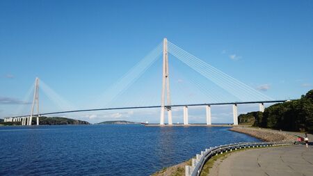 Seascape with a view of the Russian bridge. Vladivostok, Primorsky Krai.の写真素材