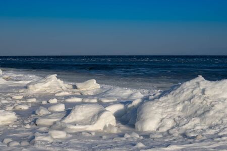 Marine landscape with views of the icy shore in winterの写真素材