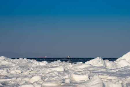 Marine landscape with views of the icy shore in winterの写真素材