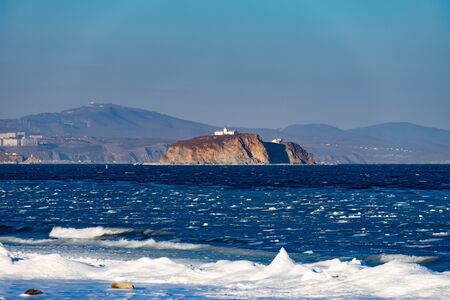 Island on the background of the seascape. Vladivostok, Russia.の写真素材