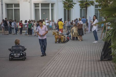 Sukhumi, Abkhazia-September 9, 2016: The city skyline overlooking the tourist street, and people.のeditorial素材