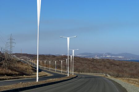 Landscape with a road on the Russian island. Vladivostok, Primorsky Kraiの写真素材