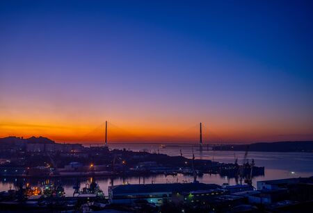 Cityscape of Vladivostok with a view of the dawn over the Bay of Diomede.の写真素材