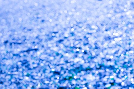 Abstract blurred background with shiny bokeh. For design and networkingの写真素材