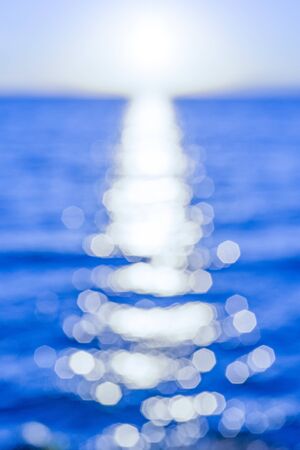 Abstract blurred background of the sea landscape at sunsetの写真素材
