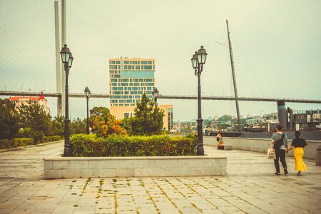 Vladivostok, Russia-August 7, 2018: Urban landscape with buildings and architecture.のeditorial素材