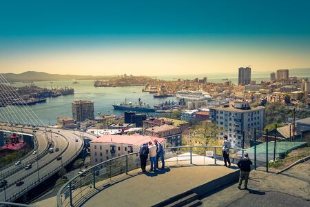 Vladivostok, Russia-may 3, 2019: Urban landscape with views of the view and tourists. People admire the beautiful city.のeditorial素材