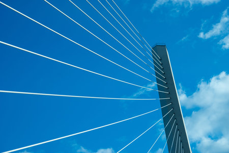 Construction of the Golden bridge against the blue sky. Vladivostok, Russia