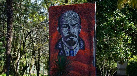 Sukhumi, Abkhazia-March 23, 2014: Large mosaic with a portrait of Lenin on the background of the Park.のeditorial素材