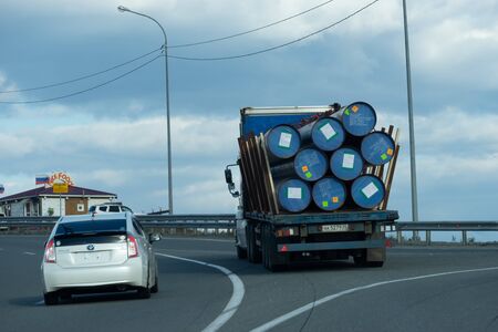 Vladivostok, Russia-October 27, 2018: Landscape with transport on the road.の写真素材