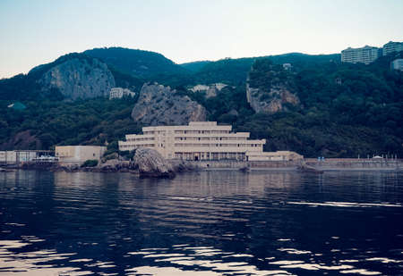 Yalta, Crimea-June 22, 2015: Coastline with resorts on the background of the sea.のeditorial素材